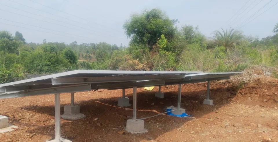 Rear view of the galvanised mounting structure supporting a ground-mounted array at Arakanakere, Karnataka